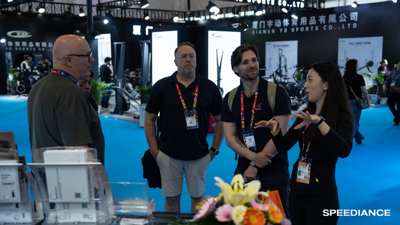 Visitors at the Speediance stand